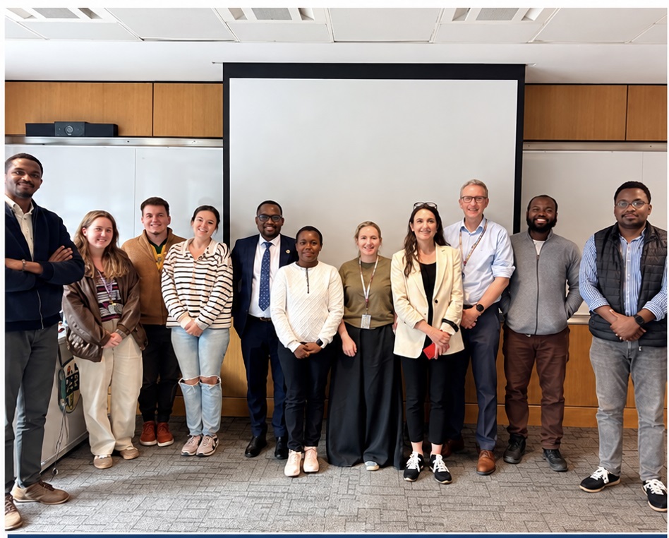 Prof. Kirenga with colleagues following the scientific seminar at UCD.